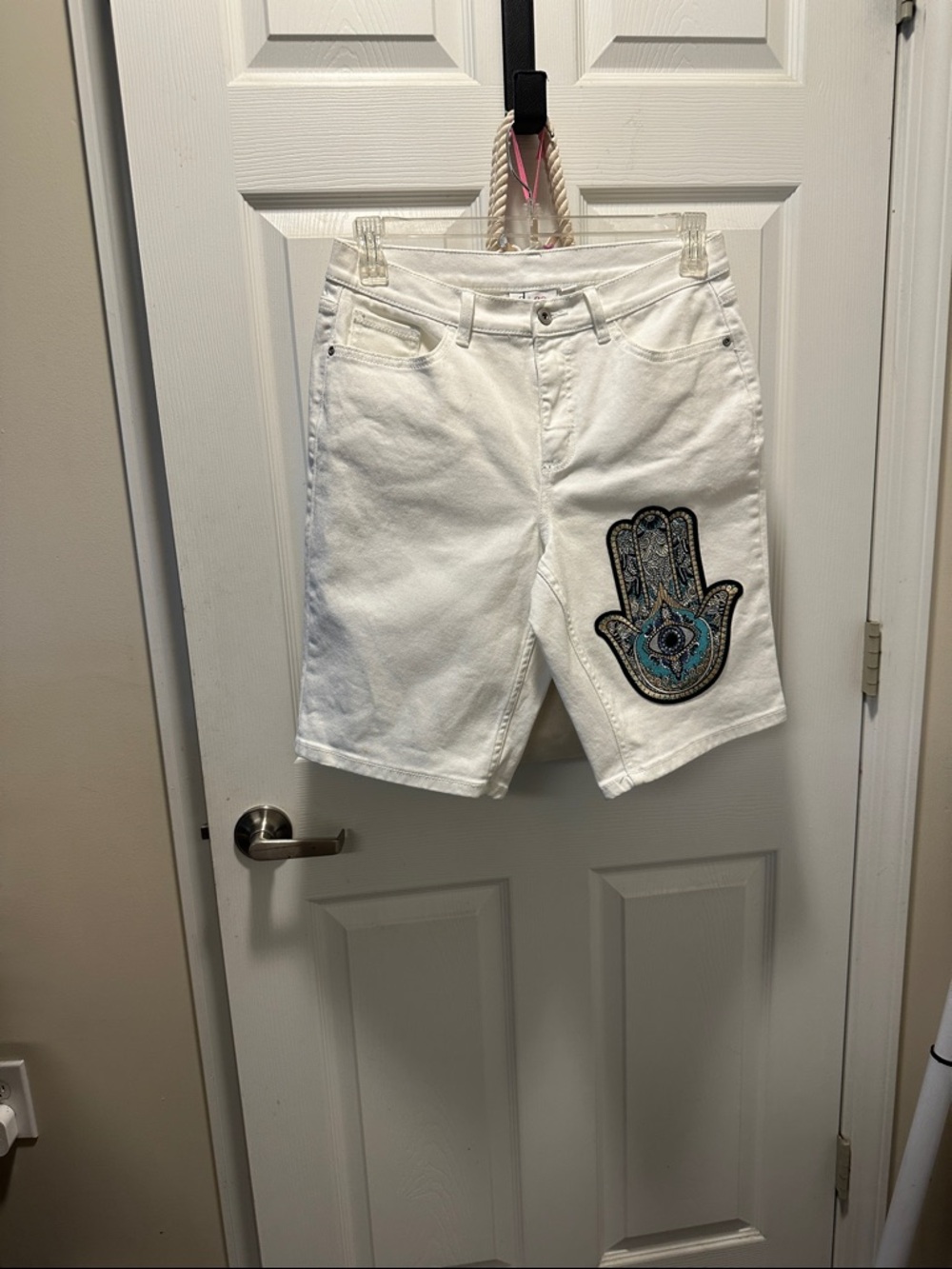 White Denim Jean Shorts with Embroidered Hamsa Patch